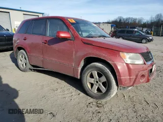 2012 Suzuki Grand Vitara Premium z VIN JS3TD0D65C4100898, wystawiony jako Copart lot #87241744 z przebiegiem Nie podano mil oraz Szkoda całkowita • Salvage title. Historia ofert i sprzedaży dostępna na DreamBid. Obrazek 4.