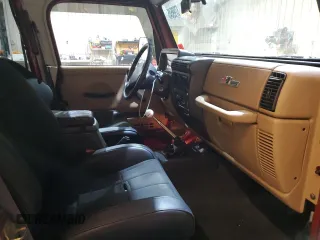 1999 Jeep Wrangler SE with VIN 1J4FY29P4XP476343, listed as a Copart auction lot 88799545 with 99,782 mi miles and Salvage Title. Bid and sale history available at carsss.com. Image 11.