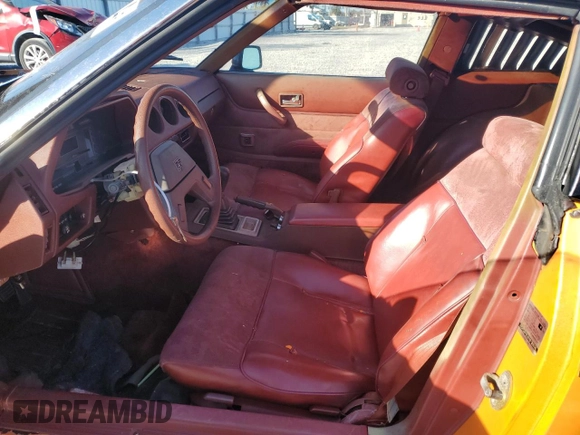 1983 Datsun 280ZX z VIN JN1HZ04S1DX572036, wystawiony jako Copart lot #76533294 z przebiegiem 172 147 mil mil oraz Nie do naprawy. Historia ofert i sprzedaży dostępna na DreamBid. Obrazek 7.