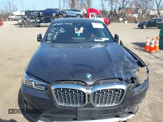 2024 BMW X4 xDrive30i with VIN 5UX33DT05R9X55093, listed as a IAAI auction lot 41811703 with 11,319 mi miles. Bid and sale history available at carsss.com. Image 12.