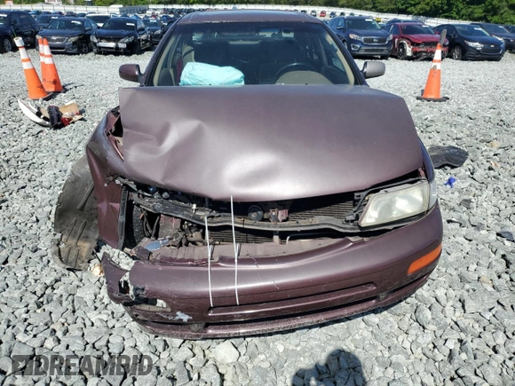 1998 Nissan Maxima GXE с VIN JN1CA21D7WM901362, выставлен на аукционе Copart как лот 58243765 с пробегом Не указан миль и Списание • Salvage title. История ставок и продаж доступна на DreamBid. Изображение 5.