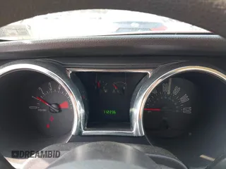 2005 Ford Mustang Deluxe with VIN 1ZVFT80N655177798, listed as a IAAI auction lot 42411831 with 112,236 mi miles and . Bid and sale history available at DreamBid. Image 7.