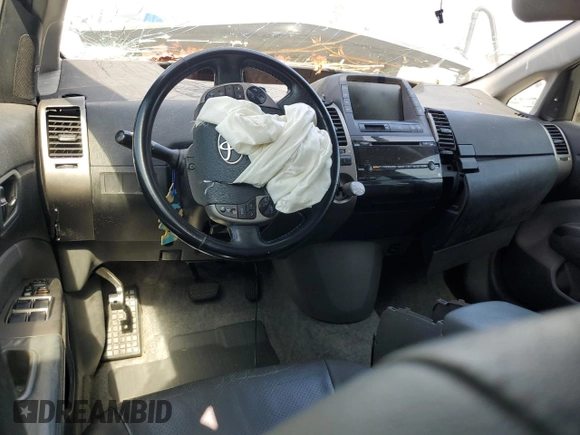 2008 Toyota Prius z VIN JTDKB20U983419671, wystawiony jako Copart lot #58446135 z przebiegiem Nie podano mil oraz Szkoda całkowita • Salvage title. Historia ofert i sprzedaży dostępna na DreamBid. Obrazek 8.