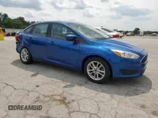 2018 Ford Focus SE with VIN 1FADP3F23JL214428, listed as a Copart auction lot 60552465 with 33,699 mi miles and Salvage title. Bid and sale history available at DreamBid. Image 1.
