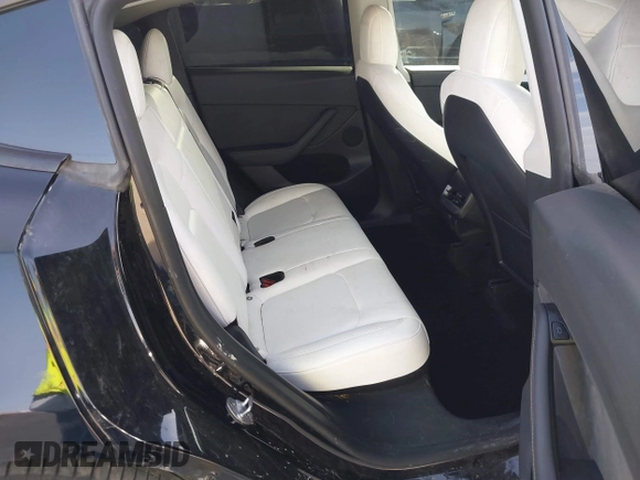 2022 Tesla Model Y Performance with VIN 7SAYGDEF6NF532027, listed as a IAAI auction lot 41717662 with 36,537 mi miles and . Bid and sale history available at DreamBid. Image 8.