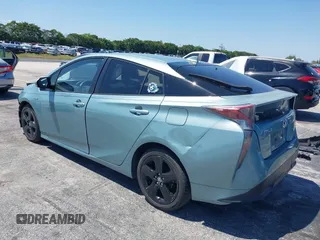 2016 Toyota Prius Four z VIN JTDKARFU0G3016597, wystawiony jako IAAI lot #42034214 z przebiegiem 125 799 mil mil oraz . Historia ofert i sprzedaży dostępna na DreamBid. Obrazek 3.