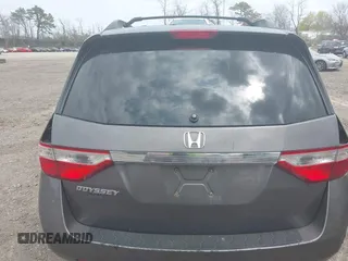 2011 Honda Odyssey EX with VIN 5FNRL5H49BB082706, listed as a IAAI auction lot 42080414 with 228,176 mi miles and . Bid and sale history available at carsss.com. Image 16.