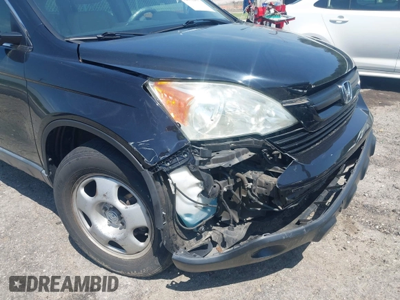 2007 Honda CR-V LX with VIN 5J6RE38377L000654, listed as a IAAI auction lot 42031455 with 112,869 mi miles. Bid and sale history available at carsss.com. Image 6.