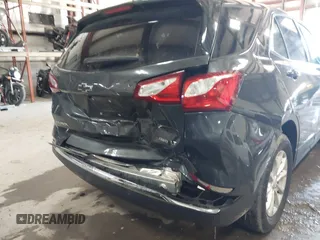 2019 Chevrolet Equinox LT with VIN 2GNAXUEV7K6113098, listed as a IAAI auction lot 41218077 with 98,553 mi miles and . Bid and sale history available at carsss.com. Image 6.