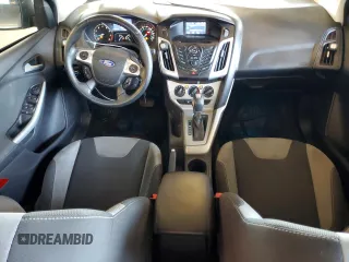 2012 Ford Focus SE with VIN 1FAHP3F28CL114572, listed as a Copart auction lot 63053035 with 142,994 mi miles and Salvage title. Bid and sale history available at DreamBid. Image 8.