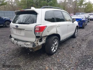 2018 Subaru Forester Touring with VIN JF2SJAWC7JH472147, listed as a IAAI auction lot 41723135 with 63,824 mi miles. Bid and sale history available at carsss.com. Image 4.