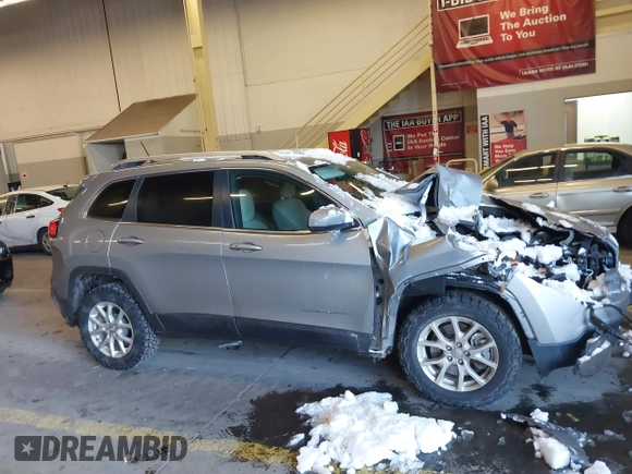 2015 Jeep Cherokee Latitude with VIN 1C4PJMCS5FW510298, listed as a IAAI auction lot 41518453 with 99,568 mi miles and . Bid and sale history available at DreamBid. Image 14.