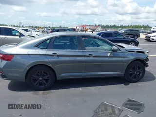 2024 Volkswagen Jetta SE with VIN 3VW7M7BU9RM005832, listed as a IAAI auction lot 42475250 with 10,036 mi miles and . Bid and sale history available at DreamBid. Image 14.