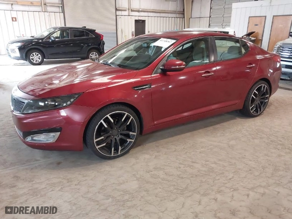 2012 Kia Optima LX with VIN 5XXGM4A75CG020124, listed as a IAAI auction lot 41748367 with 214,760 mi miles. Bid and sale history available at carsss.com. Image 2.