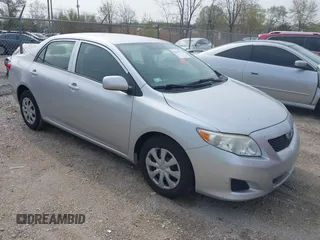 2009 Toyota Corolla with VIN JTDBL40EX9J029628, listed as a IAAI auction lot 42111711 with 168,226 mi miles. Bid and sale history available at carsss.com. Image 1.