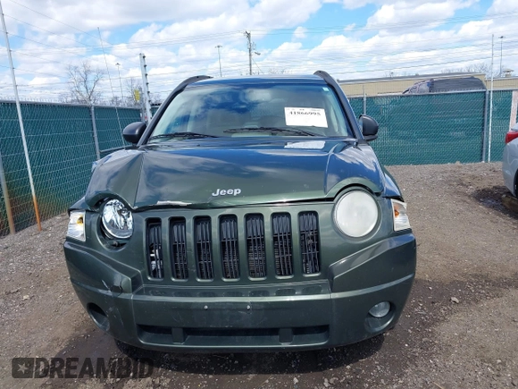 2007 Jeep Compass Sport with VIN 1J8FF47W17D585046, listed as a IAAI auction lot 41866995 with 148,196 mi miles. Bid and sale history available at carsss.com. Image 6.