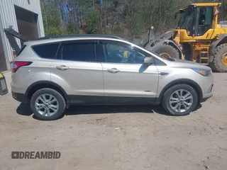 2017 Ford Escape SE with VIN 1FMCU9GD1HUD23228, listed as a IAAI auction lot 42074213 with 115,757 mi miles. Bid and sale history available at carsss.com. Image 13.