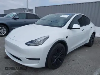 2021 Tesla Model Y Long Range with VIN 5YJYGDEE3MF081304, listed as a IAAI auction lot 42119270 with 90,521 mi miles. Bid and sale history available at carsss.com. Image 2.