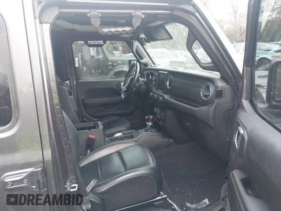2021 Jeep Wrangler Unlimited Sahara z VIN 1C4JJXP68MW745098, wystawiony jako IAAI lot #41461092 z przebiegiem 36 410 mil mil oraz . Historia ofert i sprzedaży dostępna na DreamBid. Obrazek 5.