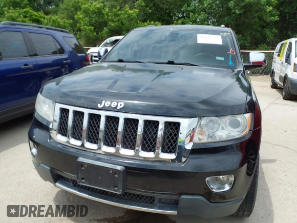 2013 Jeep Grand Cherokee Overland with VIN 1C4RJECT2DC588124, listed as a IAAI auction lot 42142573 with 204,309 mi miles and . Bid and sale history available at DreamBid. Image 6.