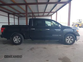 2018 Nissan Titan SV with VIN 1N6AA1E63JN512230, listed as a IAAI auction lot 42000705 with 64,479 mi miles and . Bid and sale history available at DreamBid. Image 13.