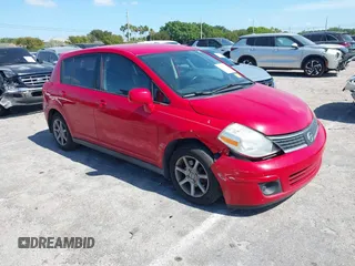 2009 Nissan Versa S with VIN 3N1BC13E69L500633, listed as a IAAI auction lot 42137113 with 193,491 mi miles and . Bid and sale history available at carsss.com. Image 1.