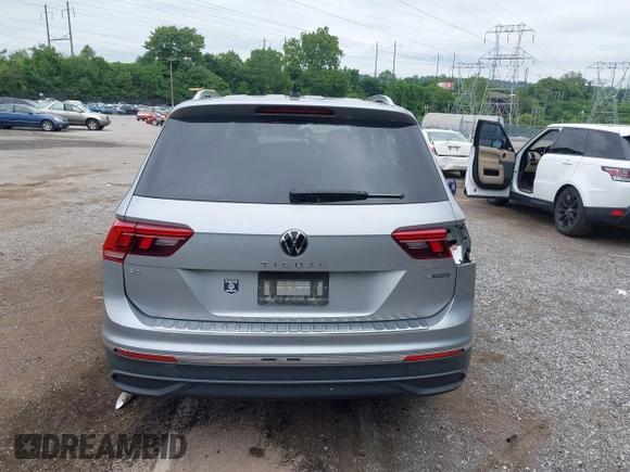 2022 Volkswagen Tiguan SE z VIN 3VV2B7AX0NM159615, wystawiony jako IAAI lot #42399370 z przebiegiem 25 352 mil mil oraz . Historia ofert i sprzedaży dostępna na DreamBid. Obrazek 16.