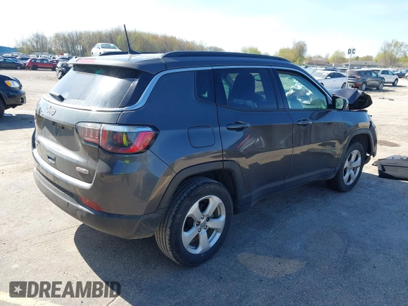 2018 Jeep Compass Altitude with VIN 3C4NJDBB6JT239565, listed as a IAAI auction lot 42219401 with 85,013 mi miles and . Bid and sale history available at DreamBid. Image 4.