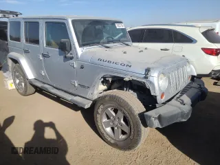 2012 Jeep Wrangler Unlimited Call of Duty MW3 с VIN 1C4BJWFG3CL103865, выставлен на аукционе Copart как лот 74237754 с пробегом 104 232 миль миль и Списание • Salvage title. История ставок и продаж доступна на DreamBid. Изображение 4.