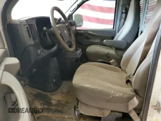 2011 Chevrolet Express Cargo z VIN 1GCZGTCG9B1186826, wystawiony jako Copart lot #82085794 z przebiegiem 202 697 mil mil oraz Nie do naprawy • Non repairable. Historia ofert i sprzedaży dostępna na DreamBid. Obrazek 7.