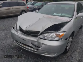 2004 Toyota Camry LE z VIN 4T1BE32KX4U842784, wystawiony jako IAAI lot #40434823 z przebiegiem 119 021 mil mil oraz . Historia ofert i sprzedaży dostępna na DreamBid. Obrazek 6.