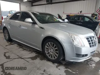 2012 Cadillac CTS Luxury z VIN 1G6DE5E58C0138378, wystawiony jako IAAI lot #41041076 z przebiegiem 170 354 mil mil oraz . Historia ofert i sprzedaży dostępna na DreamBid. Obrazek 1.