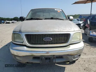 2003 Ford F-150 z VIN 2FTRX08W83CB03269, wystawiony jako Copart lot #63915625 z przebiegiem 150 127 mil mil oraz Czysty tytuł • Clean title. Historia ofert i sprzedaży dostępna na DreamBid. Obrazek 5.