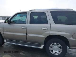 2002 Cadillac Escalade z VIN 1GYEK63N02R131870, wystawiony jako IAAI lot #41889300 z przebiegiem 328 013 mil mil oraz . Historia ofert i sprzedaży dostępna na DreamBid. Obrazek 14.