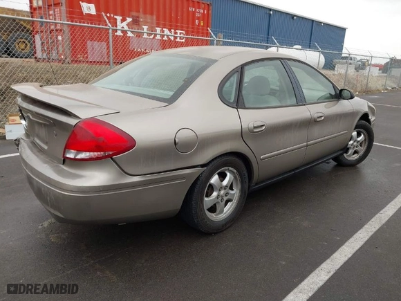 2005 Ford Taurus SE with VIN 1FAFP53215A189958, listed as a IAAI auction lot 41716597 with 99,684 mi miles. Bid and sale history available at carsss.com. Image 4.