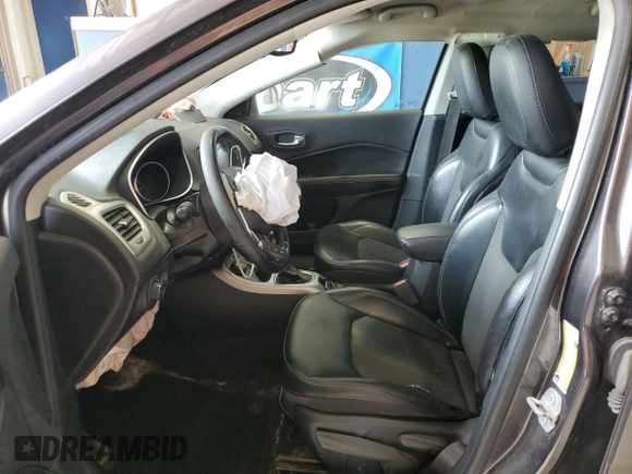 2018 Jeep Compass Altitude with VIN 3C4NJDBB9JT457242, listed as a Copart auction lot 60886385 with 143,467 mi miles and Salvage title. Bid and sale history available at DreamBid. Image 7.