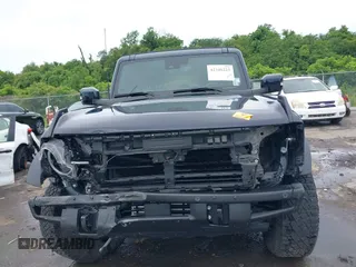 2021 Ford Bronco z VIN 1FMEE5DP2MLA89419, wystawiony jako IAAI lot #42346223 z przebiegiem Nie podano mil oraz . Historia ofert i sprzedaży dostępna na DreamBid. Obrazek 13.