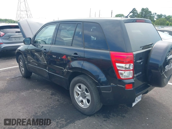 2011 Suzuki Grand Vitara Premium with VIN JS3TE0D22B4100074, listed as a IAAI auction lot 42532421 with 170,451 mi miles and . Bid and sale history available at DreamBid. Image 3.