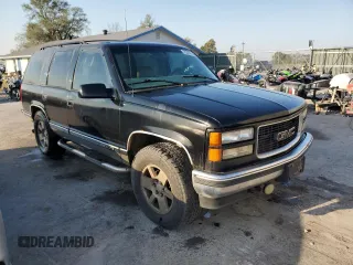 1997 GMC Yukon with VIN 1GKEK13R4VJ752757, listed as a Copart auction lot 75574214 with 251,193 mi miles and Clean Title. Bid and sale history available at carsss.com. Image 4.
