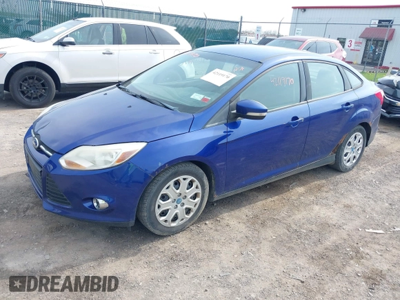 2012 Ford Focus SE with VIN 1FAHP3F21CL342199, listed as a IAAI auction lot 42119170 with 185,307 mi miles and . Bid and sale history available at carsss.com. Image 2.