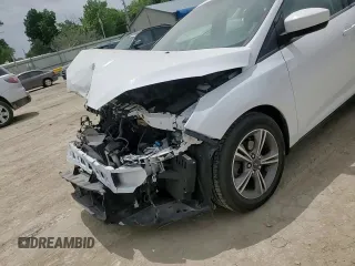 2018 Ford Focus SE with VIN 1FADP3F27JL264670, listed as a Copart auction lot 57184815 with 35,187 mi miles and Salvage title. Bid and sale history available at DreamBid. Image 14.