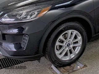 2021 Ford Escape SE with VIN 1FMCU9G64MUA42925, listed as a IAAI auction lot 42858756 with 79,685 mi miles and . Bid and sale history available at DreamBid. Image 23.