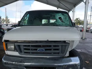 2005 Ford Econoline Cargo with VIN 1FTNE24L25HA10061, listed as a IAAI auction lot 41566517 with 247,777 mi miles and . Bid and sale history available at DreamBid. Image 12.