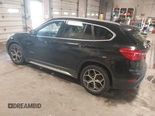 2016 BMW X1 xDrive28i z VIN WBXHT3C34GP884207, wystawiony jako IAAI lot #41686036 z przebiegiem 122 406 mil mil oraz . Historia ofert i sprzedaży dostępna na DreamBid. Obrazek 3.