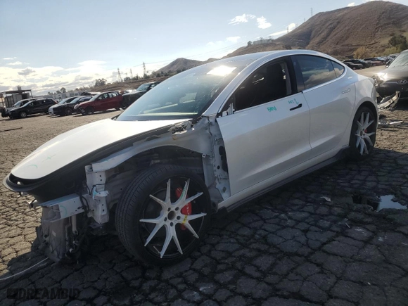 2019 Tesla Model 3 Mid Range with VIN 5YJ3E1EA5KF485617, listed as a Copart auction lot 42179575 with 101,257 mi miles and Salvage Title. Bid and sale history available at carsss.com. Image 1.