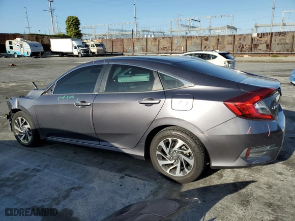 2016 Honda Civic Sedan EX with VIN 19XFC2F74GE229932, listed as a Copart auction lot 50645955 with 131,119 mi miles and Salvage Title. Bid and sale history available at carsss.com. Image 2.