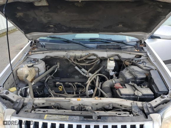 2009 Mercury Mariner Premier with VIN 4M2CU87709KJ06169, listed as a Copart auction lot 45117035 with 208,223 mi miles and Salvage Title. Bid and sale history available at carsss.com. Image 12.