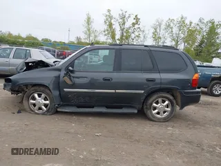 2007 GMC Envoy SLE z VIN 1GKDS13S572214421, wystawiony jako IAAI lot #42186747 z przebiegiem Nie podano mil oraz . Historia ofert i sprzedaży dostępna na DreamBid. Obrazek 14.
