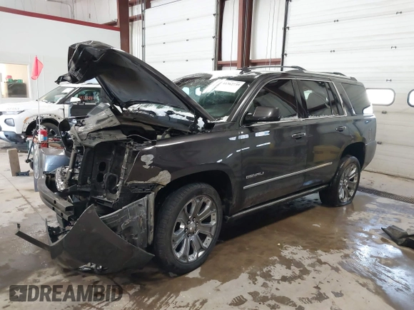 2016 GMC Yukon Denali with VIN 1GKS2CKJ8GR215954, listed as a IAAI auction lot 41362739 with 143,982 mi miles. Bid and sale history available at carsss.com. Image 2.