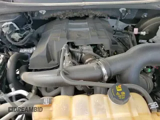 2018 Ford F-150 XL with VIN 1FTEW1CP6JFB62877, listed as a Copart auction lot 82221905 with 118,405 mi miles and Salvage title. Bid and sale history available at DreamBid. Image 14.